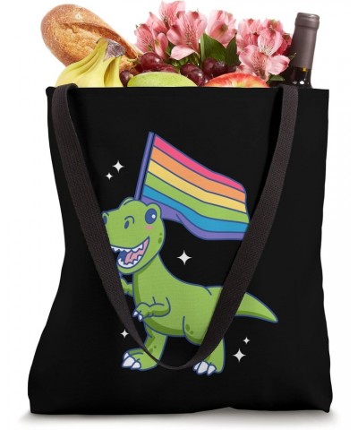 LGBTQ T-Rex Pride Month Dinosaur With Rainbow Flag Tote Bag $11.02 Totes